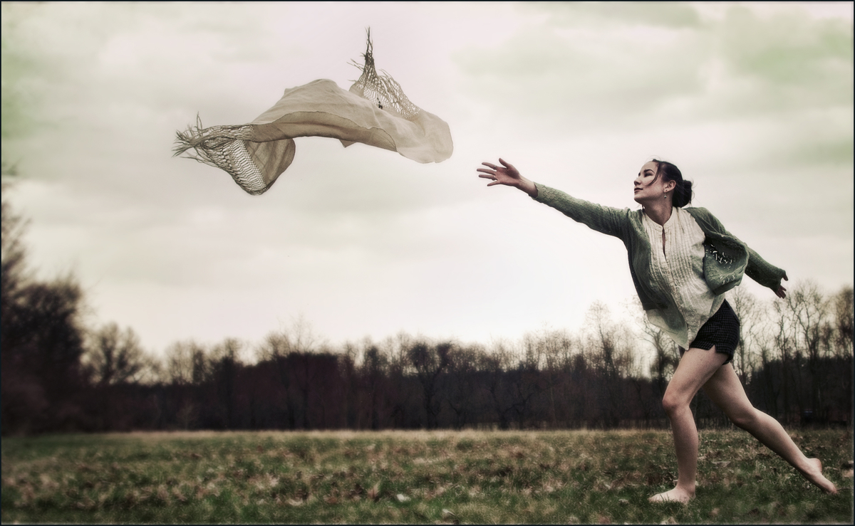 fleeting-past-woman-and-windy-day