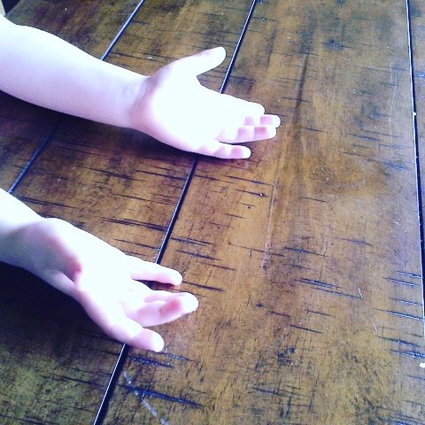 open hands on floor