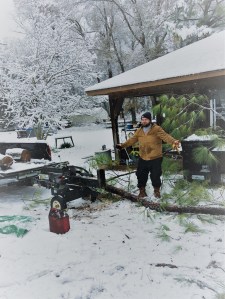 julian and branch in snow